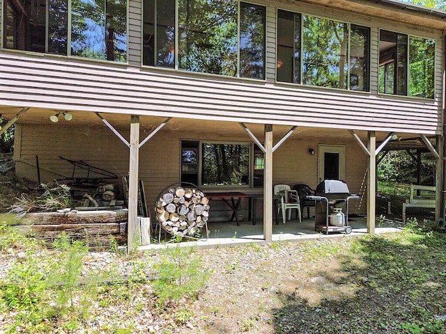 176 Perkins Beach Rd, Wayne, ME 04284 - back of house with a patio area
