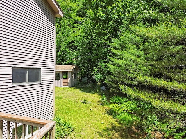 176 Perkins Beach Rd, Wayne, ME 04284 - view of grassy yard featuring an outdoor structure