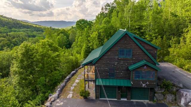 30 Hillside Dr, Kingfield, ME 04947 - view of subject property featuring a heavily wooded area and mountains