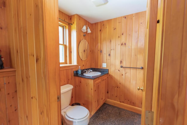 30 Hillside Dr, Kingfield, ME 04947 - bathroom featuring vanity and wood walls
