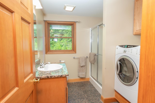 30 Hillside Dr, Kingfield, ME 04947 - bathroom featuring washer / clothes dryer, vanity, and a shower stall