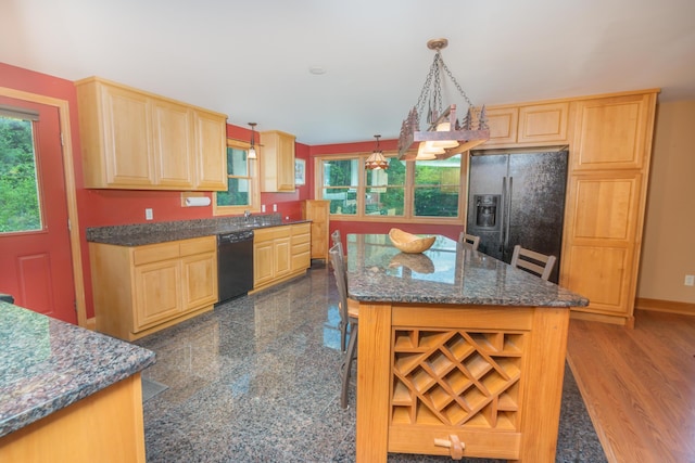 30 Hillside Dr, Kingfield, ME 04947 - kitchen featuring black appliances, light brown cabinets, and plenty of natural light