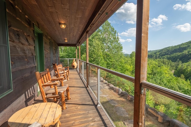 30 Hillside Dr, Kingfield, ME 04947 - wooden terrace featuring a view of trees