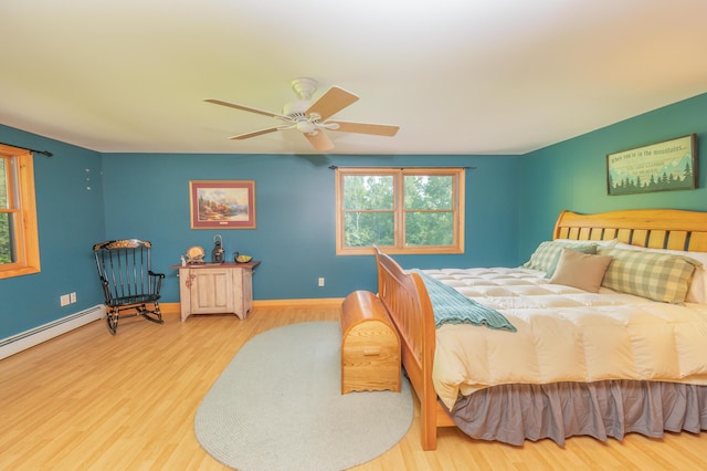 30 Hillside Dr, Kingfield, ME 04947 - bedroom with multiple windows, wood finished floors, and a ceiling fan
