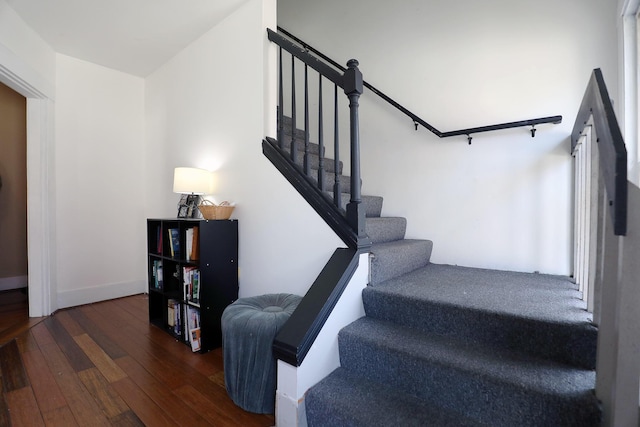 41 Dunn St, Auburn, ME 04210 - stairs with wood-type flooring and baseboards