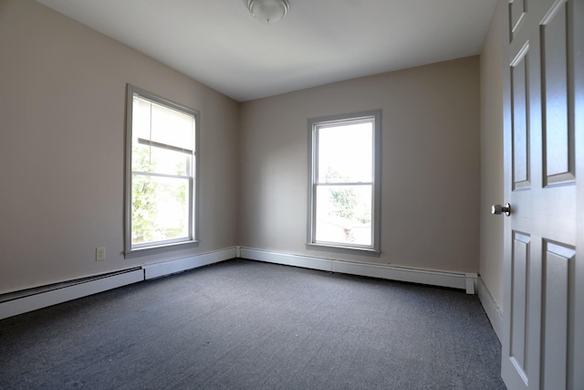 41 Dunn St, Auburn, ME 04210 - empty room featuring dark colored carpet and baseboards