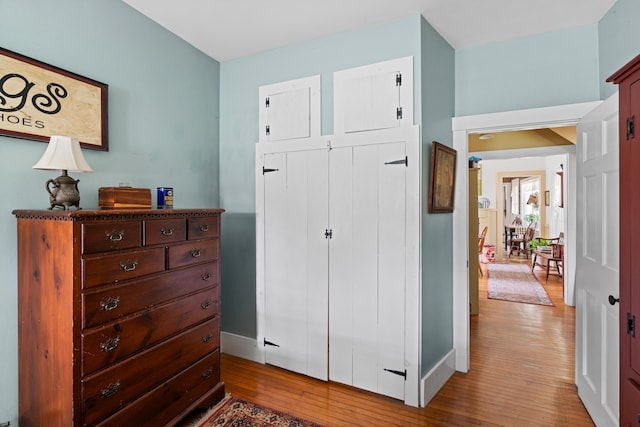 22 River Rd, Dresden, ME 04342 - bedroom with hardwood / wood-style flooring and a closet