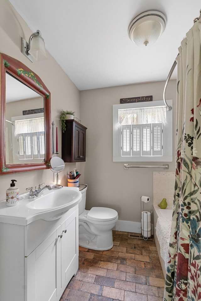 22 River Rd, Dresden, ME 04342 - full bath featuring plenty of natural light, vanity, and shower / bathtub combination with curtain