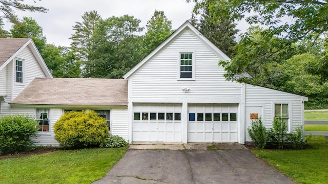 22 River Rd, Dresden, ME 04342 - view of front of property featuring a front lawn, driveway, and roof with shingles