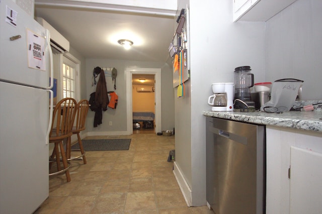 30 Burnham St, Old Town, ME 04468 - kitchen featuring freestanding refrigerator, dishwasher, and white cabinetry