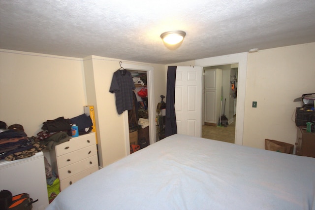 30 Burnham St, Old Town, ME 04468 - bedroom featuring a closet and a textured ceiling