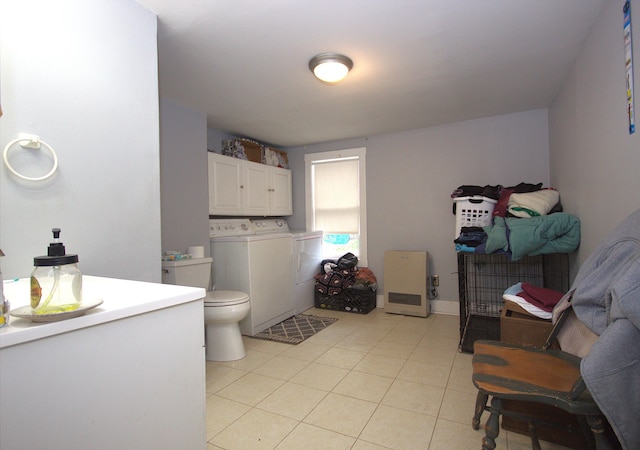 30 Burnham St, Old Town, ME 04468 - bathroom featuring separate washer and dryer and tile patterned flooring