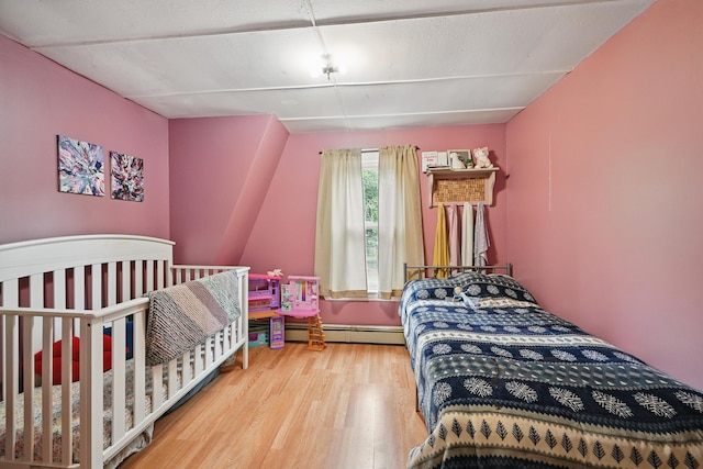 2 Clark St, Randolph, ME 04346 - bedroom featuring wood finished floors and baseboard heating