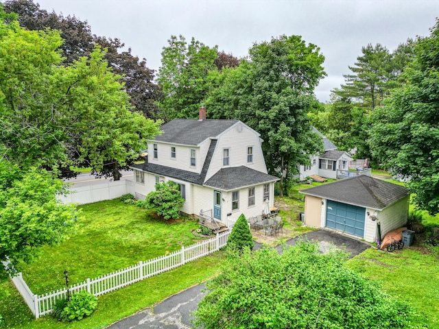 2 Clark St, Randolph, ME 04346 - view of front facade with an outbuilding, a chimney, a garage, a shingled roof, and a gambrel roof