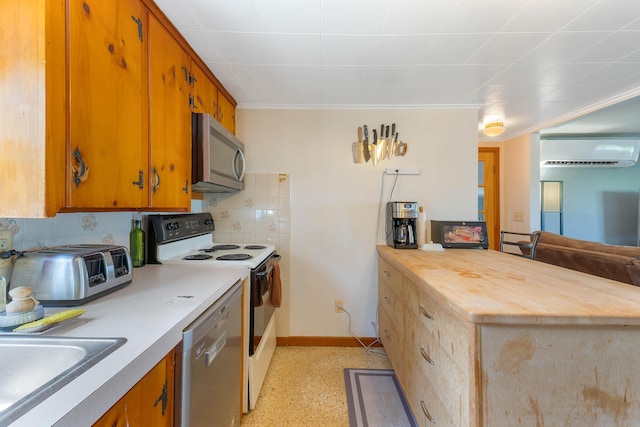 911 Spring St, Westbrook, ME 04092 - kitchen with appliances with stainless steel finishes, a wall mounted AC, wooden counters, tasteful backsplash, and brown cabinetry