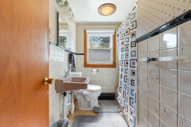 911 Spring St, Westbrook, ME 04092 - bathroom with tile walls, wallpapered walls, and a shower