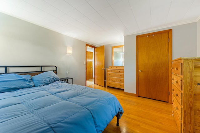 911 Spring St, Westbrook, ME 04092 - bedroom featuring light wood-style floors and crown molding