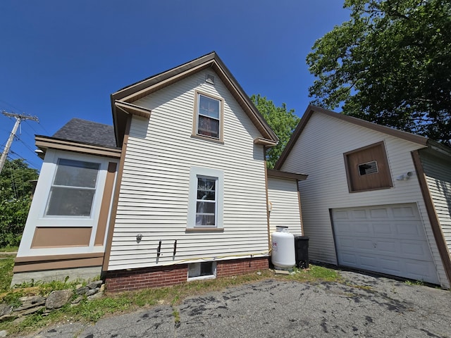 314 River Rd, Orrington, ME 04474 - view of home's exterior with a garage