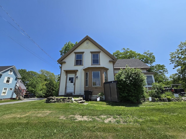 314 River Rd, Orrington, ME 04474 - victorian-style house with a front lawn