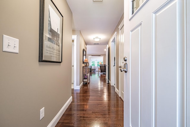 375 Pride St Unit 15, Westbrook, ME 04092 - hallway with dark wood-style floors and baseboards