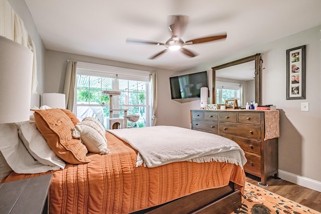 375 Pride St Unit 15, Westbrook, ME 04092 - bedroom with light wood-style floors and a ceiling fan