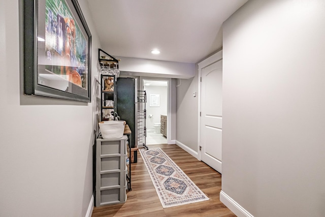 375 Pride St Unit 15, Westbrook, ME 04092 - hallway with wood finished floors and recessed lighting