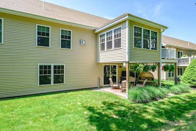 375 Pride St Unit 15, Westbrook, ME 04092 - rear view of house with a patio area and a yard