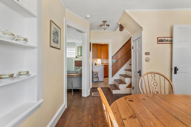 15 Myrtle Ave, South Portland, ME 04106 - dining space with dark wood-style flooring and stairway