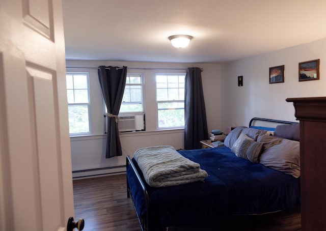 55 Ossipee Trl E, Standish, ME 04084 - bedroom featuring a baseboard radiator, multiple windows, dark wood-type flooring, and cooling unit