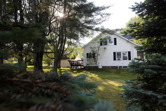 55 Ossipee Trl E, Standish, ME 04084 - rear view of property with a lawn and a deck