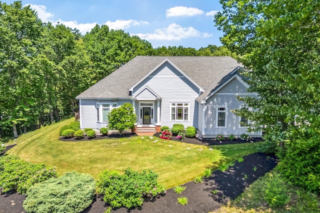 2 Summit Ln, Raymond, ME 04071 - view of front facade with a front yard and a shingled roof