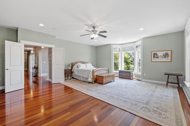 2 Summit Ln, Raymond, ME 04071 - bedroom with hardwood / wood-style floors, a baseboard heating unit, recessed lighting, and ceiling fan