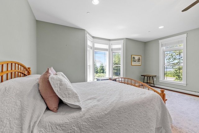 2 Summit Ln, Raymond, ME 04071 - carpeted bedroom featuring multiple windows, baseboard heating, and recessed lighting
