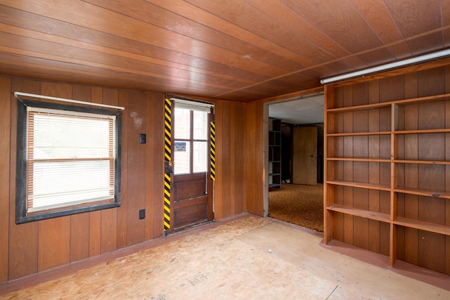 4 Sterling Rd, Kittery, ME 03904 - unfurnished room featuring wooden ceiling and wooden walls