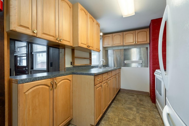 4 Sterling Rd, Kittery, ME 03904 - kitchen featuring white appliances, dark countertops, and light brown cabinets