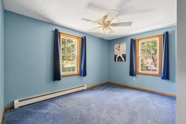 24 Maple Ridge Rd, Gorham, ME 04038 - carpeted spare room featuring baseboard heating, plenty of natural light, a ceiling fan, and a textured ceiling