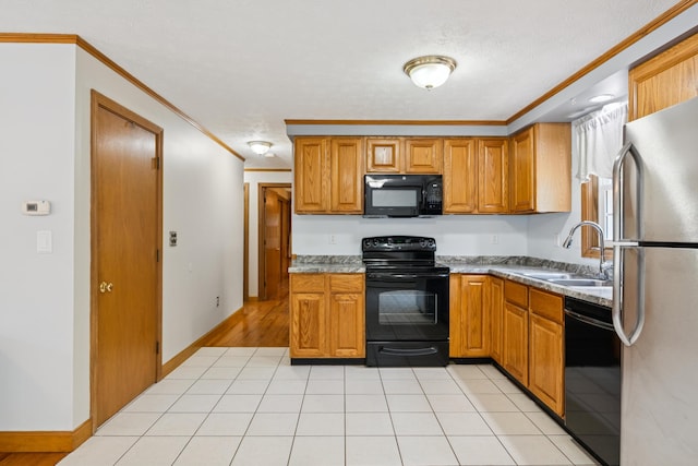 24 Maple Ridge Rd, Gorham, ME 04038 - kitchen featuring black appliances, crown molding, and brown cabinets