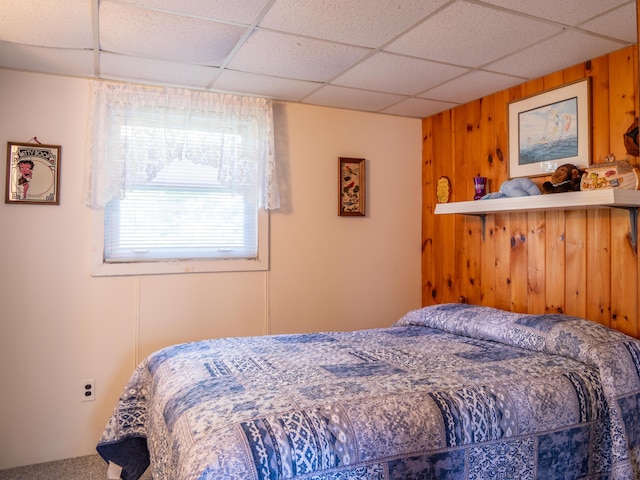16 Hide Away Ln, Milton, NH 03851 - bedroom featuring a paneled ceiling and wood walls
