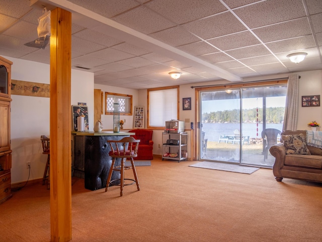 16 Hide Away Ln, Milton, NH 03851 - dining area featuring a drop ceiling, light carpet, and a bar
