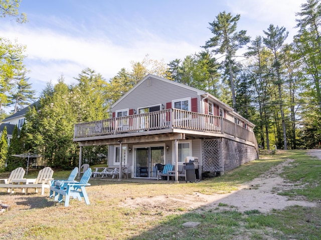 16 Hide Away Ln, Milton, NH 03851 - back of house featuring a deck and a lawn