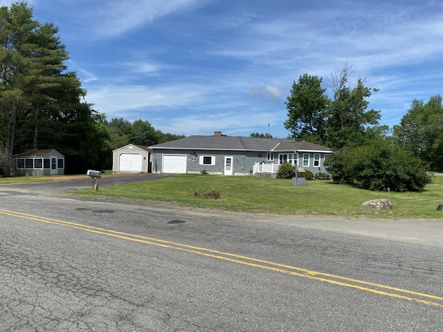 68 Stetson Rd, Newport, ME 04953 - ranch-style house with a front yard, driveway, and a chimney