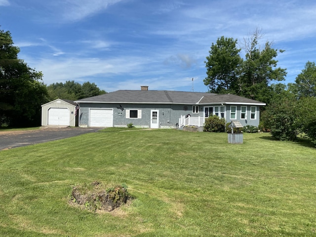 68 Stetson Rd, Newport, ME 04953 - single story home featuring asphalt driveway, a front lawn, and a chimney