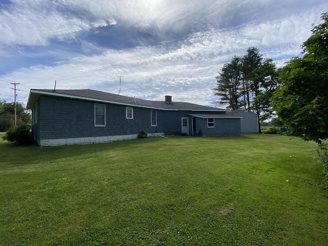 68 Stetson Rd, Newport, ME 04953 - back of property featuring a chimney and a yard