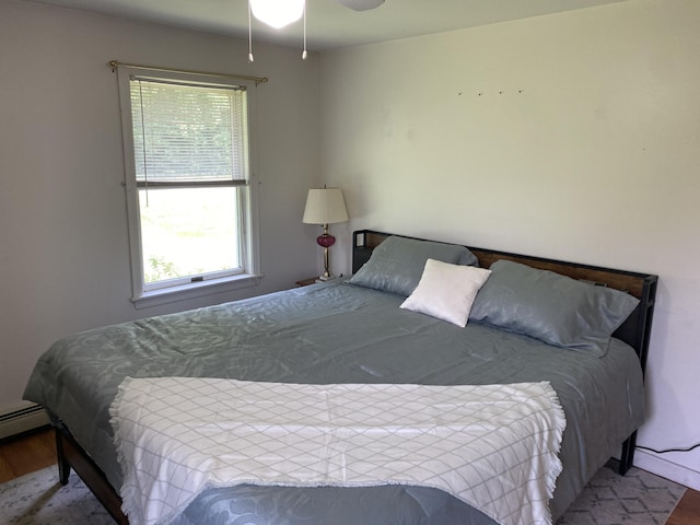68 Stetson Rd, Newport, ME 04953 - bedroom featuring wood finished floors, multiple windows, and ceiling fan