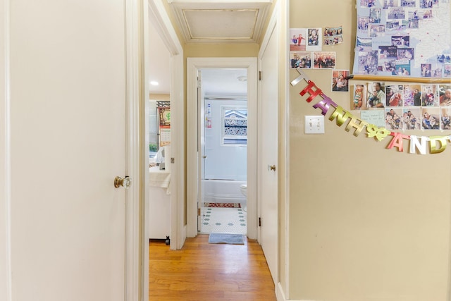 96 Holm Ave, Portland, ME 04102 - corridor with light wood-type flooring, crown molding, and attic access
