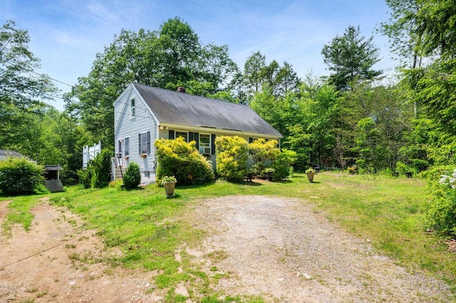 93 Bartlett Rd, Kittery, ME 03905 - view of front of house with a chimney
