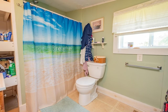 57 Main St, Sangerville, ME 04479 - bathroom featuring toilet and shower / bath combo with shower curtain