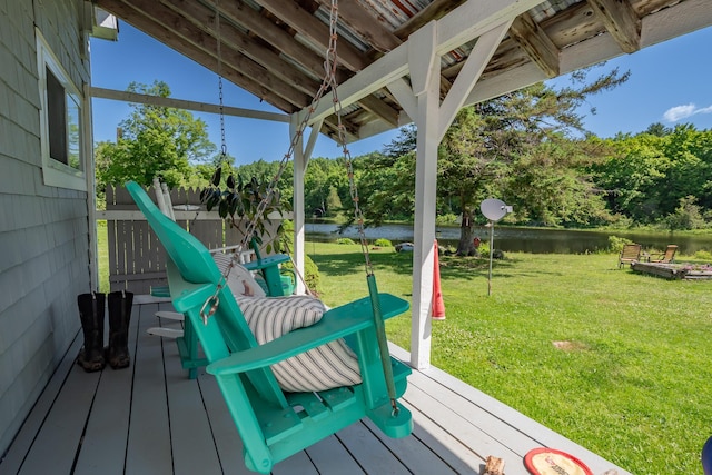 57 Main St, Sangerville, ME 04479 - wooden terrace with a water view and a yard