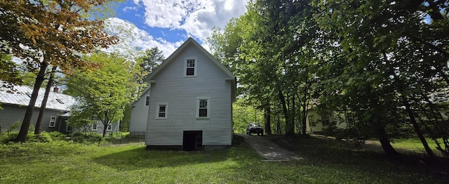 555 Depot St, Wilton, ME 04294 - view of side of home featuring a yard