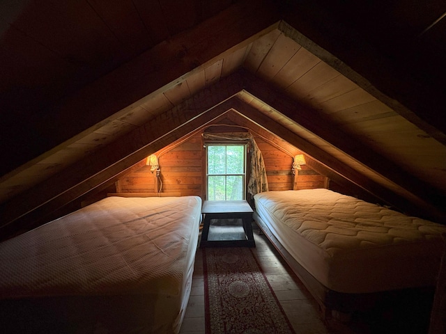124 S Shore Dr, Rangeley Plt, ME 04970 - bedroom featuring vaulted ceiling, wood walls, wood ceiling, and wood finished floors